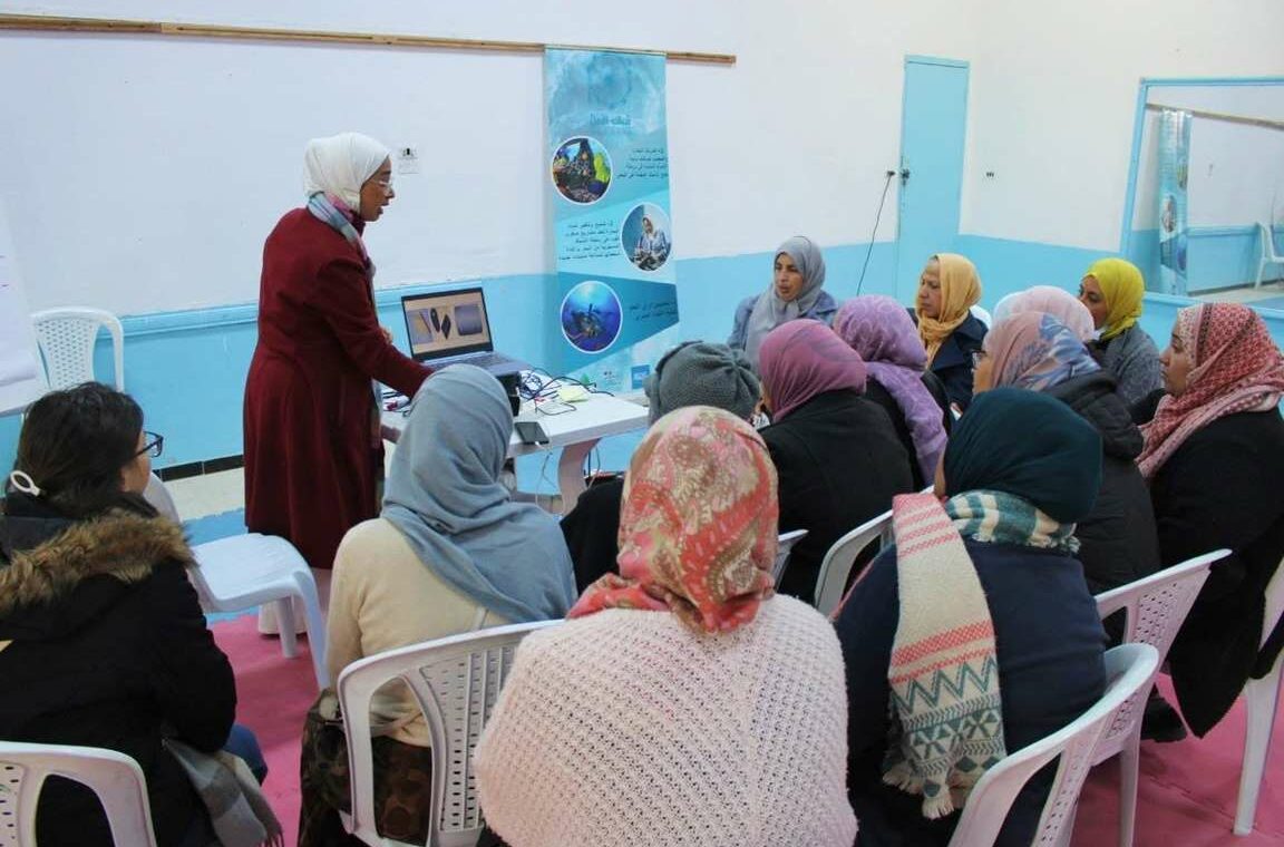 Women taking part in a capacity-building workshop