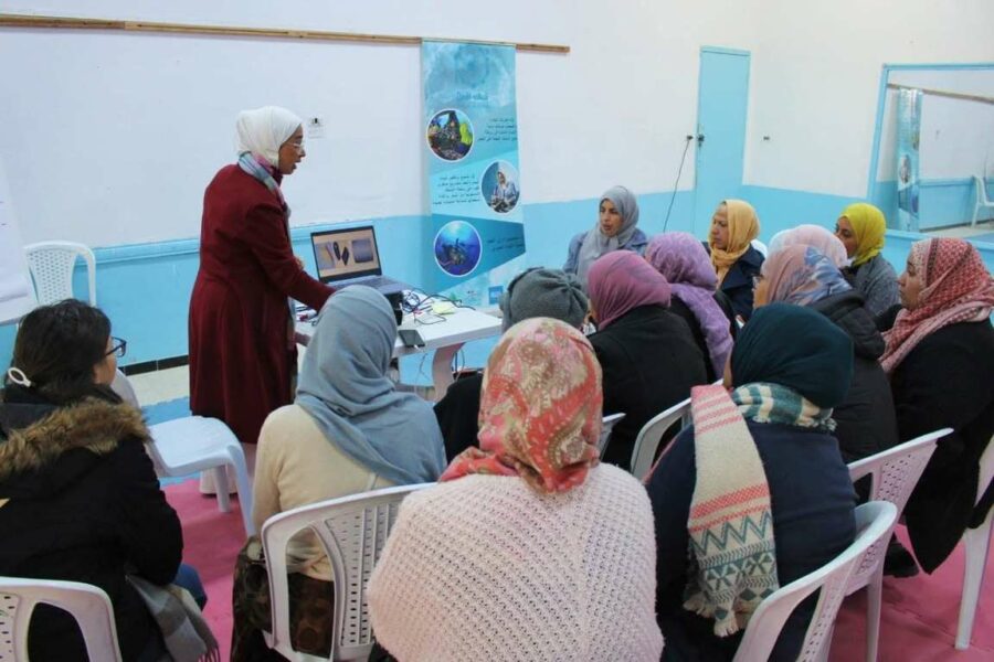 Women taking part in a capacity-building workshop